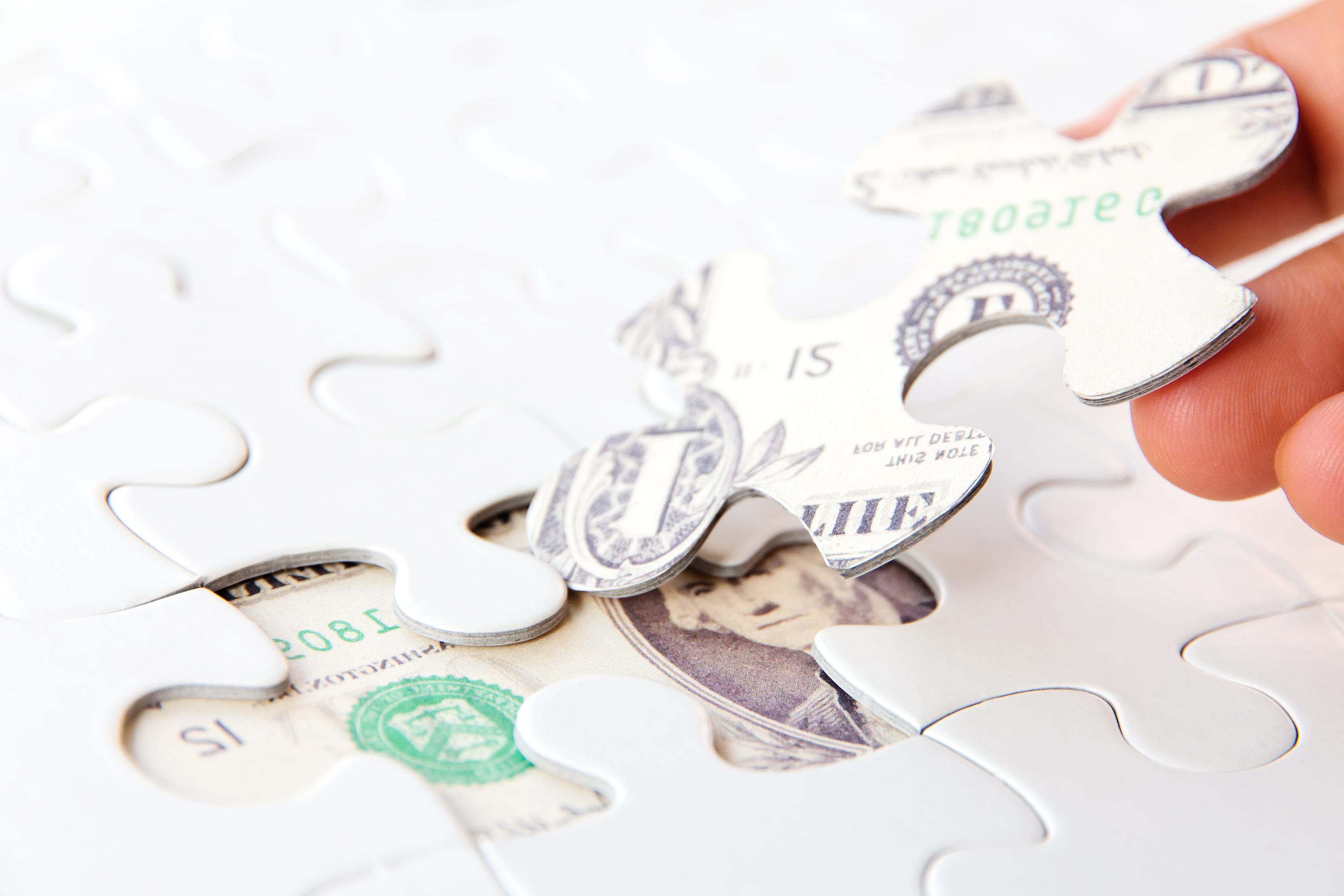 Puzzle i amerykańskie banknoty